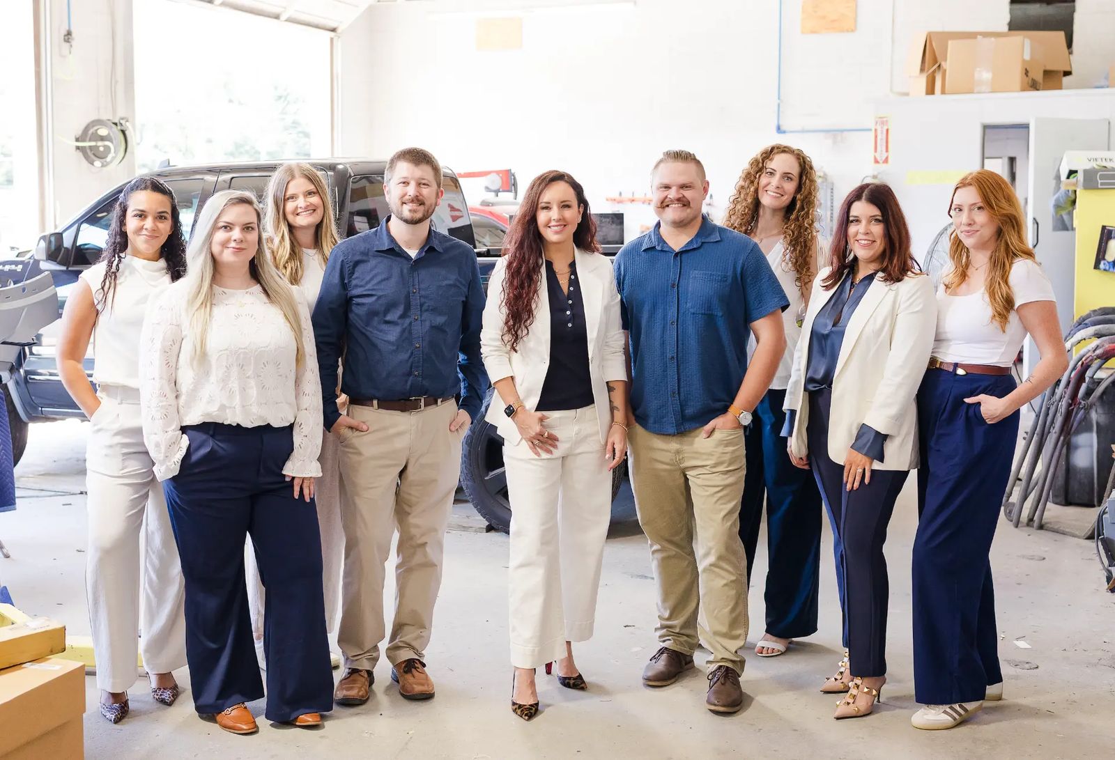 Jeni Bukolt with HAVEN Creative clients at a manufacturer's workshop